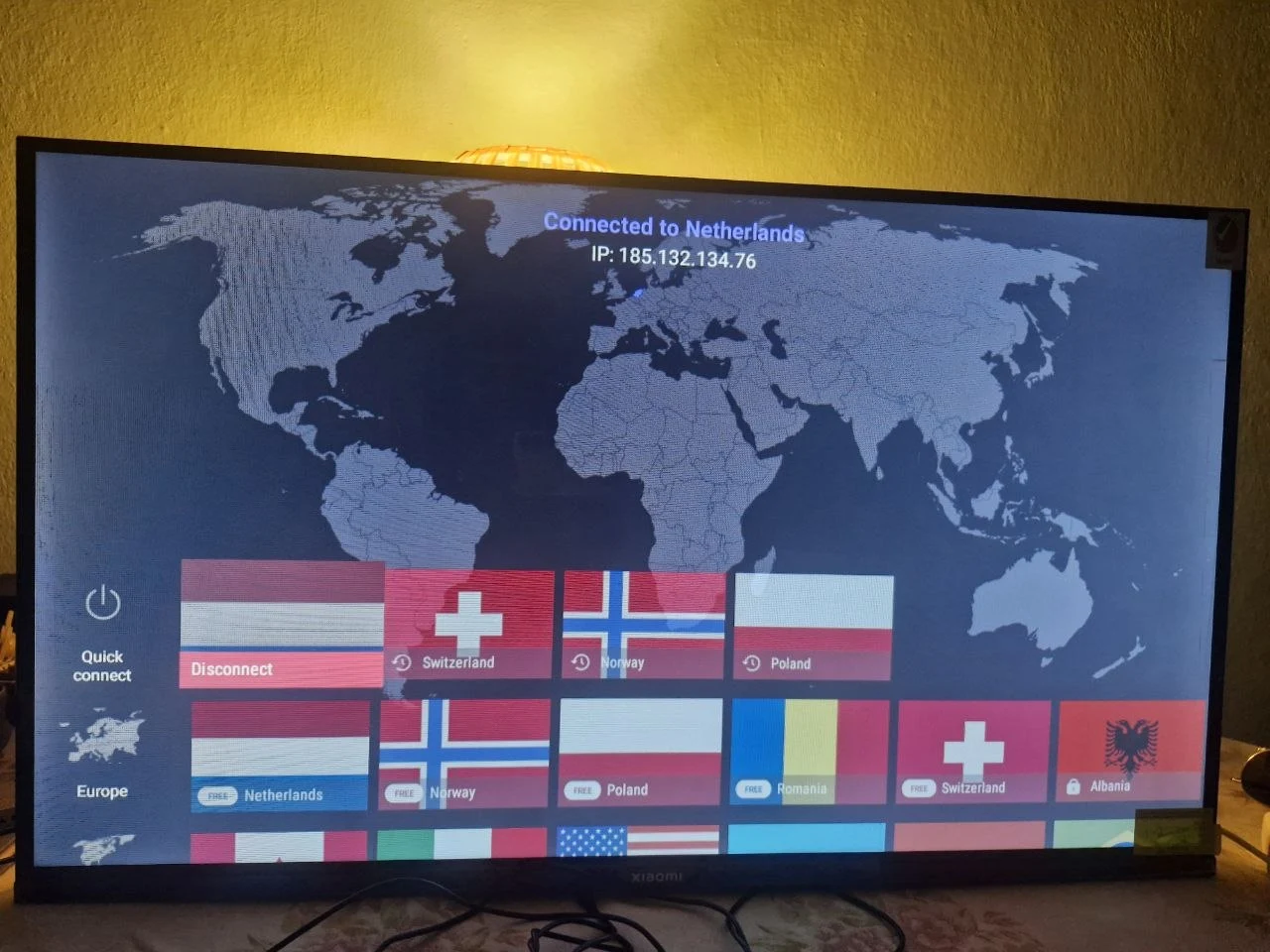 Proton VPN connected to a Netherlands server on Android TV, with a free server list shown below the map